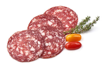 Sliced Dried sausage or salami, smoked meat, close-up, isolated on white background