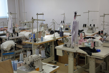 A small workshop for sewing clothes with professional equipment and tools