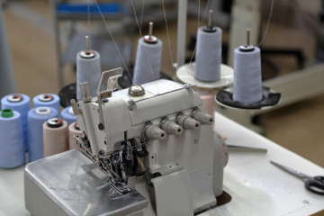 A small workshop for sewing clothes with professional equipment and tools