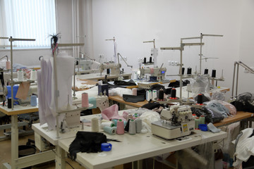 A small workshop for sewing clothes with professional equipment and tools