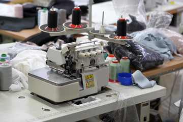 A small workshop for sewing clothes with professional equipment and tools