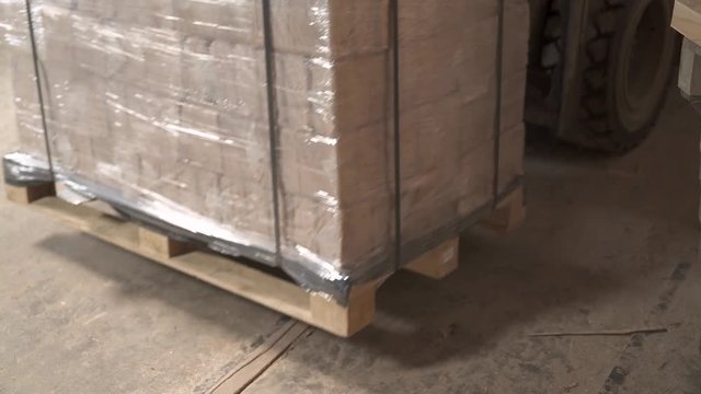 A demonstration video of sawdust briquettes transporting by a forklift