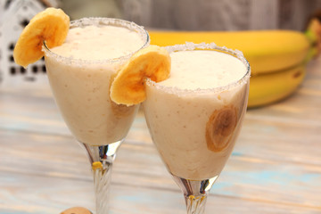 Banana smoothies on wood table