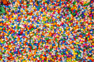Fototapeta na wymiar Colorful plastic toy bricks for enhance child development