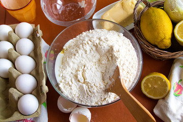 ingredients for homemade lemon cake, which are on the table