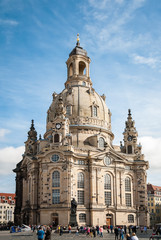Fototapeta na wymiar Frauenkirche (Our Lady church) and a statue in the center of old town in Dresden, Germany