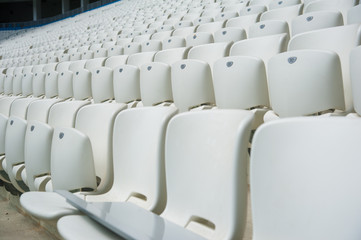 Empty white seats in stadium