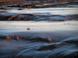 Water drenched mud flats