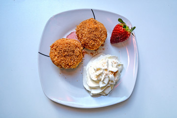 Strawberry dumplings with sweet cream