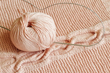 Exclusive knitted pattern and ball of delicate pink threads with steel circular knitting needles. Hobbies and recreation. Handmade.