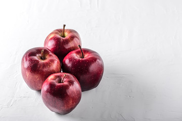 Apple on a white board with copyspace