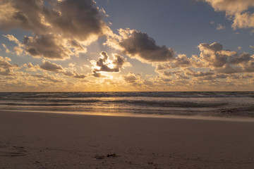 Obraz premium Sunset over the beach of the Mayan Riviera in Tulum, Quintana Roo, Mexico