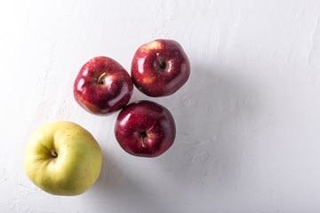 Apple on a white board with copyspace