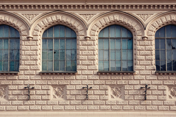 facade of a historic building with frontal windows