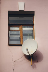 satellite dish on a residential building