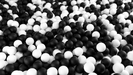 Black white 3D illustration from a pile of abstract spheres and balls rolling and falling from top to bottom.