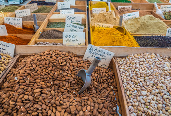 Tradition spices and nuts in the stalls of the farmers market in Syracuse (Siracusa), a historic city on the island of Sicily, Italy.