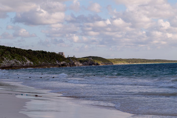 Fototapeta premium Sunset over the beach of the Mayan Riviera in Tulum, Quintana Roo, Mexico