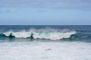 great crashing waves on the rock coast