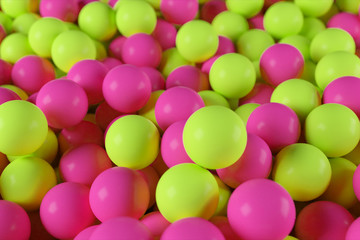 Colorful 3d illustration background from a pile of abstract yellow and pink spheres