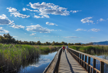 Two women tourists in the Tablas de Daimiel National Park, Ciudad Real, Spain.