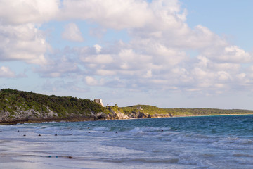 Fototapeta premium Sunset over the beach of the Mayan Riviera in Tulum, Quintana Roo, Mexico