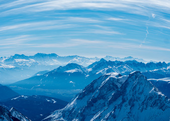 View from the German Zugspitze across the top of a snow mountain landscape
