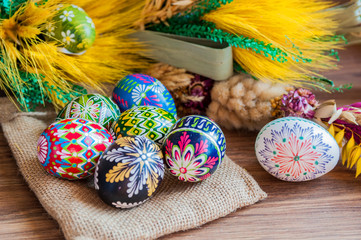 Fototapeta Wielkanoc. Kolorowe wielkanocne jajka i palma wielkanocna obraz