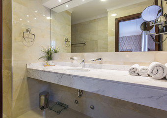 Hotel bathroom interior with shower cabin