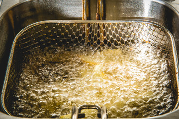Potatoes fried in used fryer