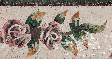 Detail of a beautiful marble mosaic panel. Interior marble mosaic. A piece of marble Venetian mosaic as a decorative background .. Selective focus