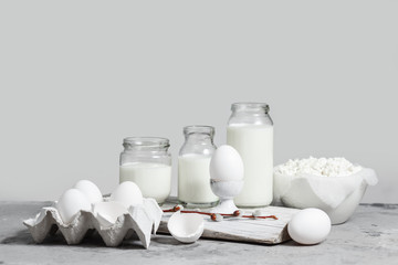 Fresh dairy and fermented milk products. Eggs On a white background.