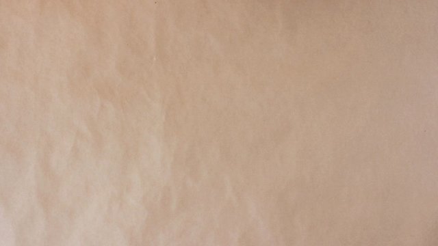 Stop motion animation. Different types of plastic garbage makes frame on craft paper background.   Earth pollution, recycling concept. 