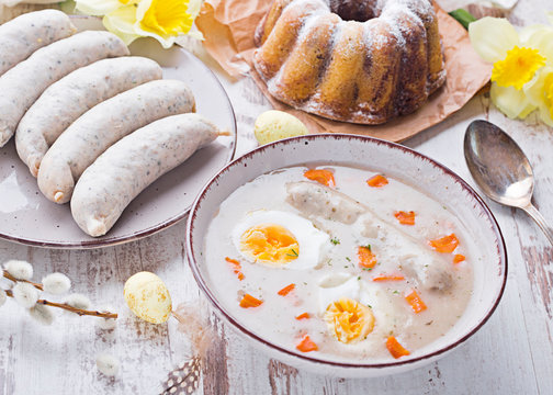 Easter Breakfast. Sour Rye Soup With Eggs And Sausage