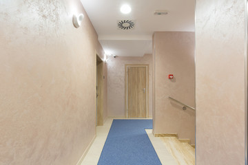 Hotel corridor with marble floor