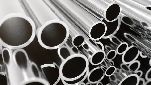Industry business production and heavy metallurgical industrial products, many shiny steel pipes, industrial background, manufacturing business production concept, 3D illustration