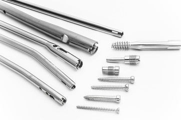 Screws and pegs made of stainless steel isolated on the white background