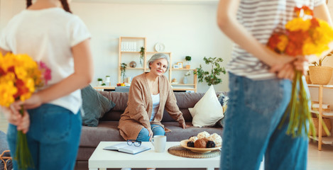 mother's day! three generations of  family mother, grandmother and daughter congratulate on the...