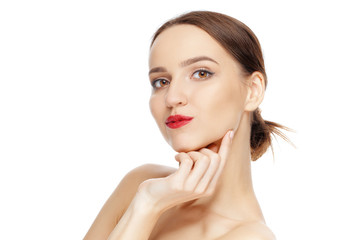 Fototapeta premium Beautiful girl looks skeptical, props chin with hand. Young wooman expressing mistrust and disbelief.