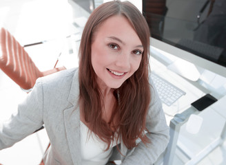 modern business woman sitting at her Desk.
