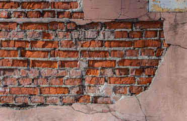 brick wall texture with collapsed plaster