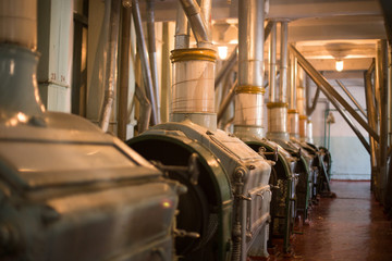 Industrial wheat processing machine at an old time flour production plant Soviet. Separates the...