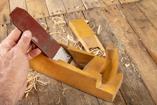 Strug in an old carpentry workshop. Sharpening and conservation of the old carpentry tool.