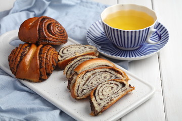 Poppy seed rolls and green tea