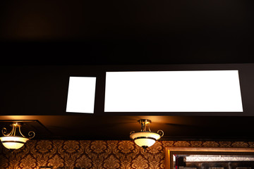 Blank ad Mock up frame on the blurred background of the bar - Empty space for advertisement