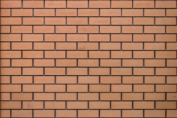 texture of exactly laid orange bricks