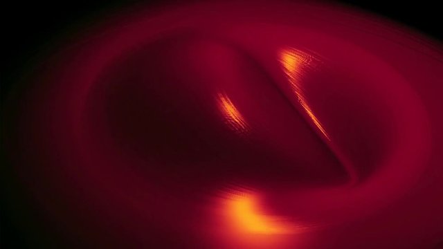 Abstract animation of moving pink glossy and liquid texture. Colorful abstraction.