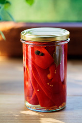 Jar of fermented peppers