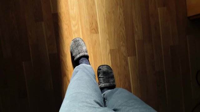 Ill elder man putting on slippers to go to the bathroom because of prostate problems 4k