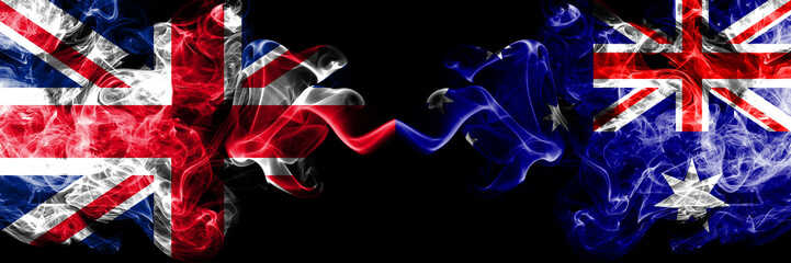 United Kingdom vs Australia, Australian smoky mystic flags placed side by side. Thick colored silky smoke flags of Great Britain and Australia, Australian.